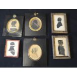 A quantity of Victorian framed silhouettes.