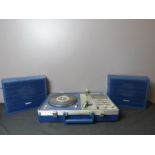 A Sanyo record player with speakers in blue.