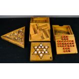 Four wooden games/puzzles, including one by Lagoon Games.