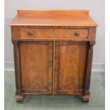 A Georgian mahogany secretaire / chiffonier, with upper drawer opening to reveal a fitted