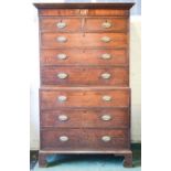 A 19th century mahogany chest on chest, with crossbanding and oval brass handles, raised on