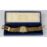 A 9ct gold wristwatch by JW Benson Ltd, of 25 Old Bond Street, London; Watchmakers & Jewellers,