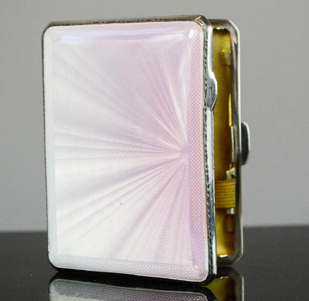 An Art Deco enamel and silver ladies cigarette case, by Frederick Field, Birmingham, 3.06toz.