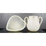 A Belleek basket and twin spouted jug 9cm high.