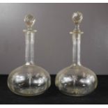 A pair of French wine decanters.