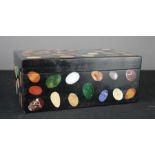 A pietra dura marble lidded box with specimen marble egg form inserts. 10 by 24 by 14cm.