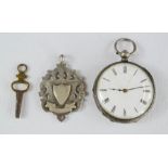 A 19th century pocket watch and fob.