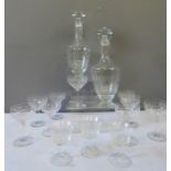 A set of Edwardian glasses with matching decanters.