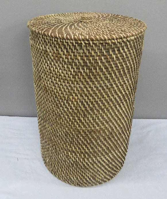 A wicker linen basket.