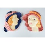 Two hand painted Art Deco style wall plaques; female profile portraits.