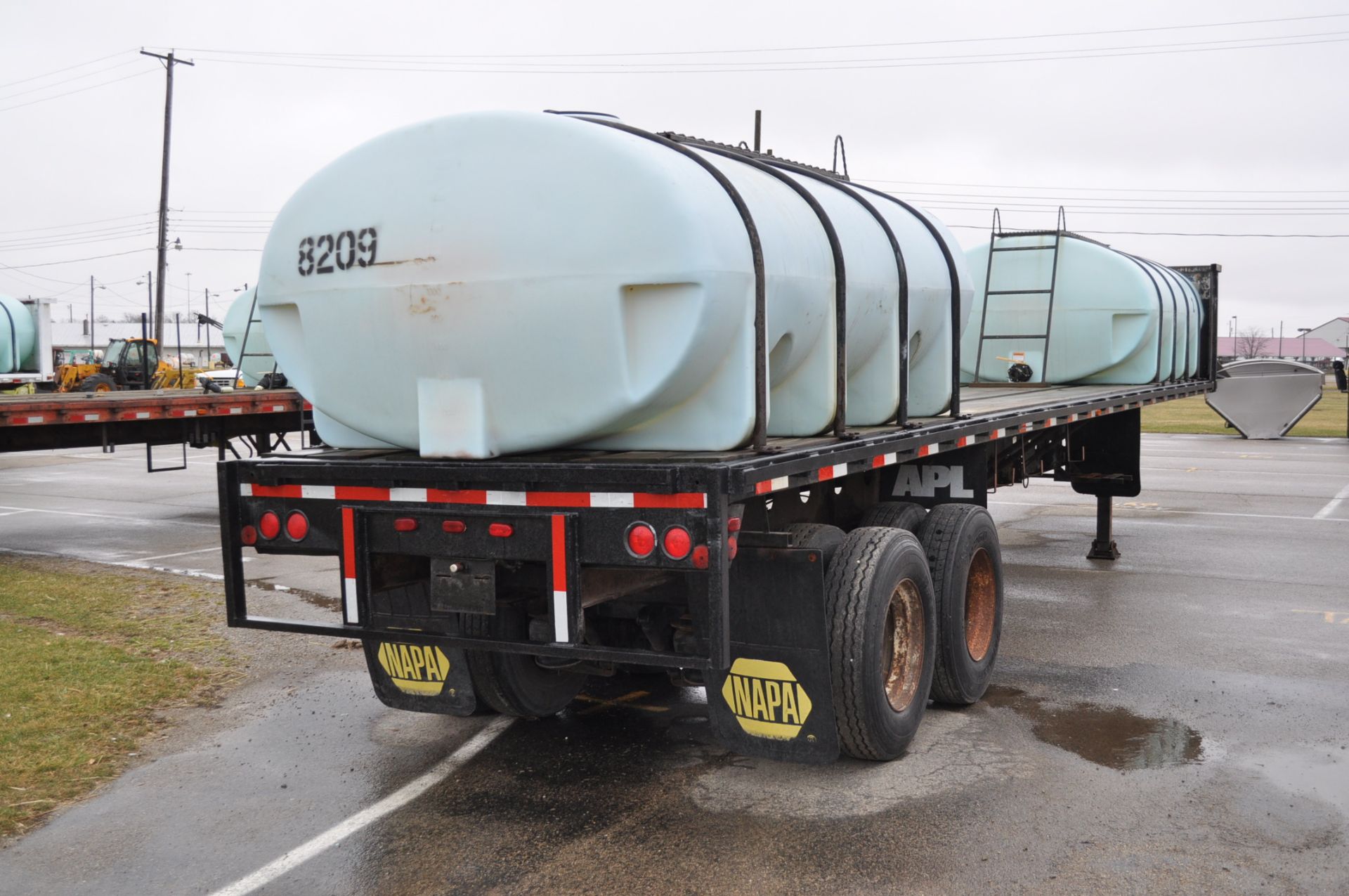 1982 Transcraft 40’ flat trailer with 2-2000gl poly tanks - Image 3 of 7