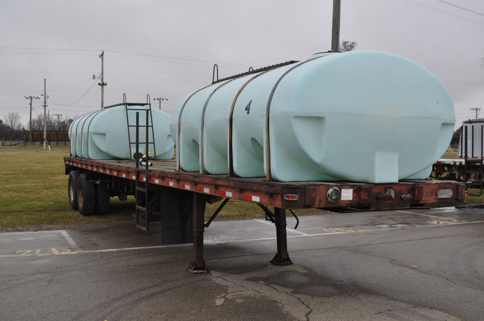 1972 Clark Equip 40’ flat trailer with 2-2000gl poly tanks - Image 4 of 6