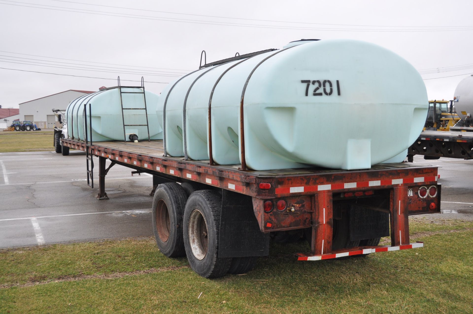 1972 Clark Equip 40’ flat trailer with 2-2000gl poly tanks - Image 2 of 6