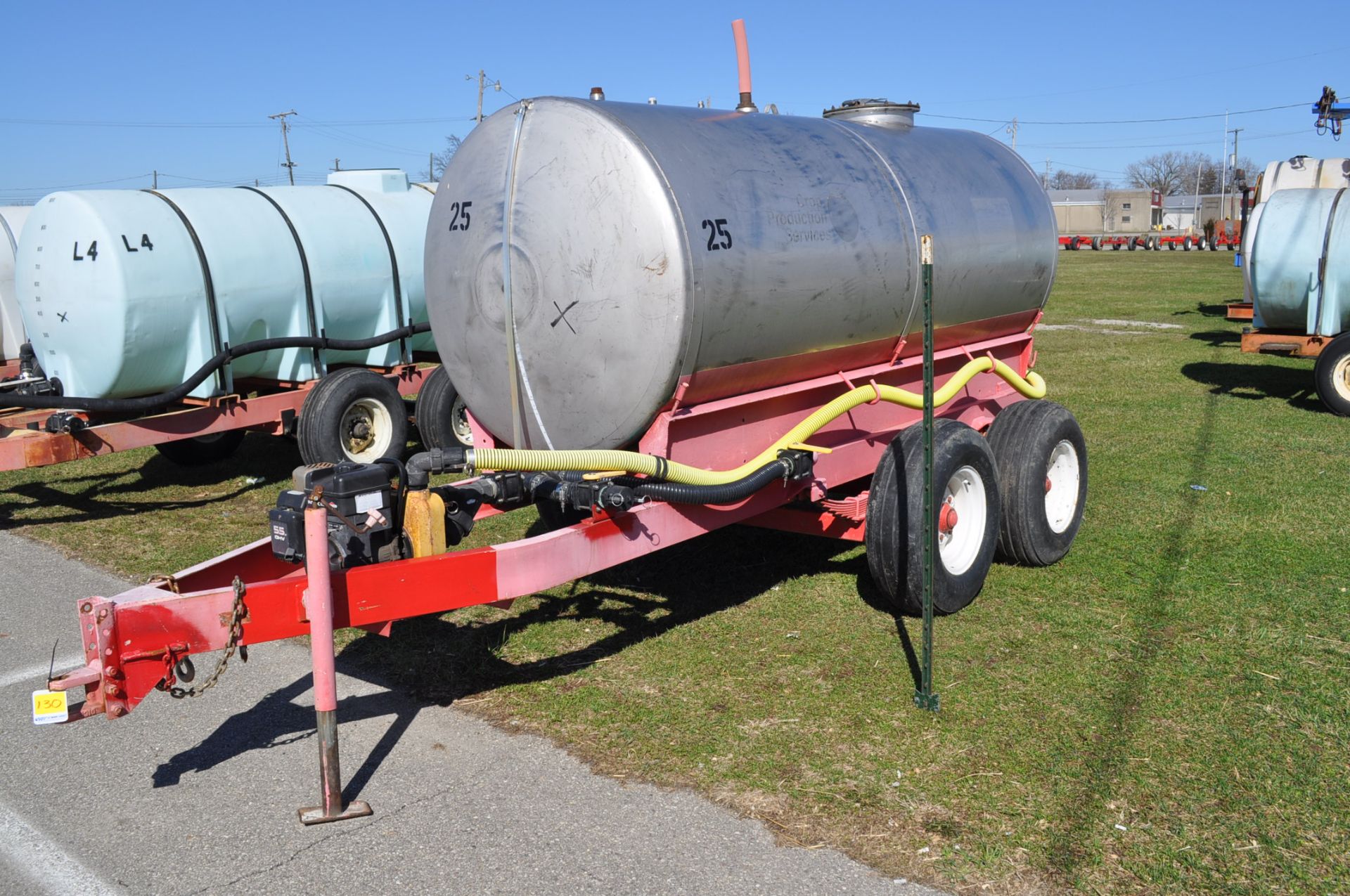 1000 gal SS fertilizer trailer, tandem axle, 2" pump and hose