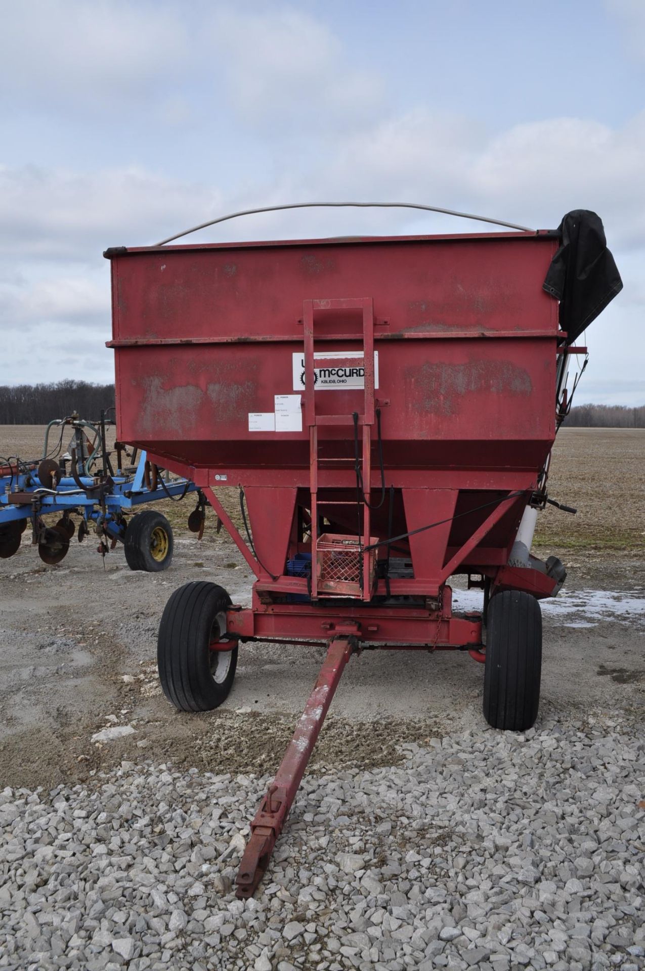 Unverferth McCurdy gravity wagon with gear, ploy cupped poly tube auger, hyd power unit