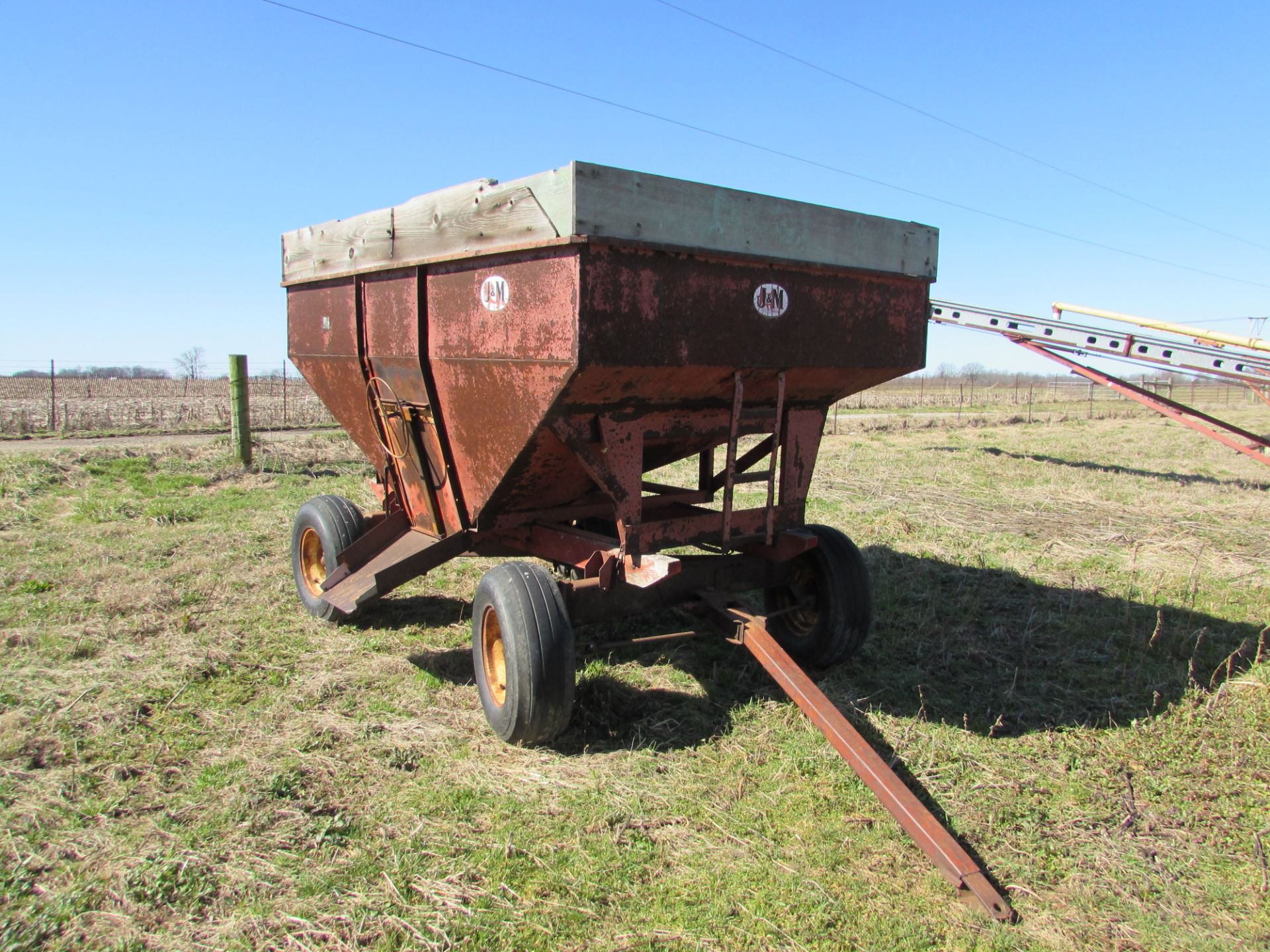 J&M 250 bushel gravity wagon, wood extensions, Wayne Murphy  Wilmington, Ohio (937) 725-7853