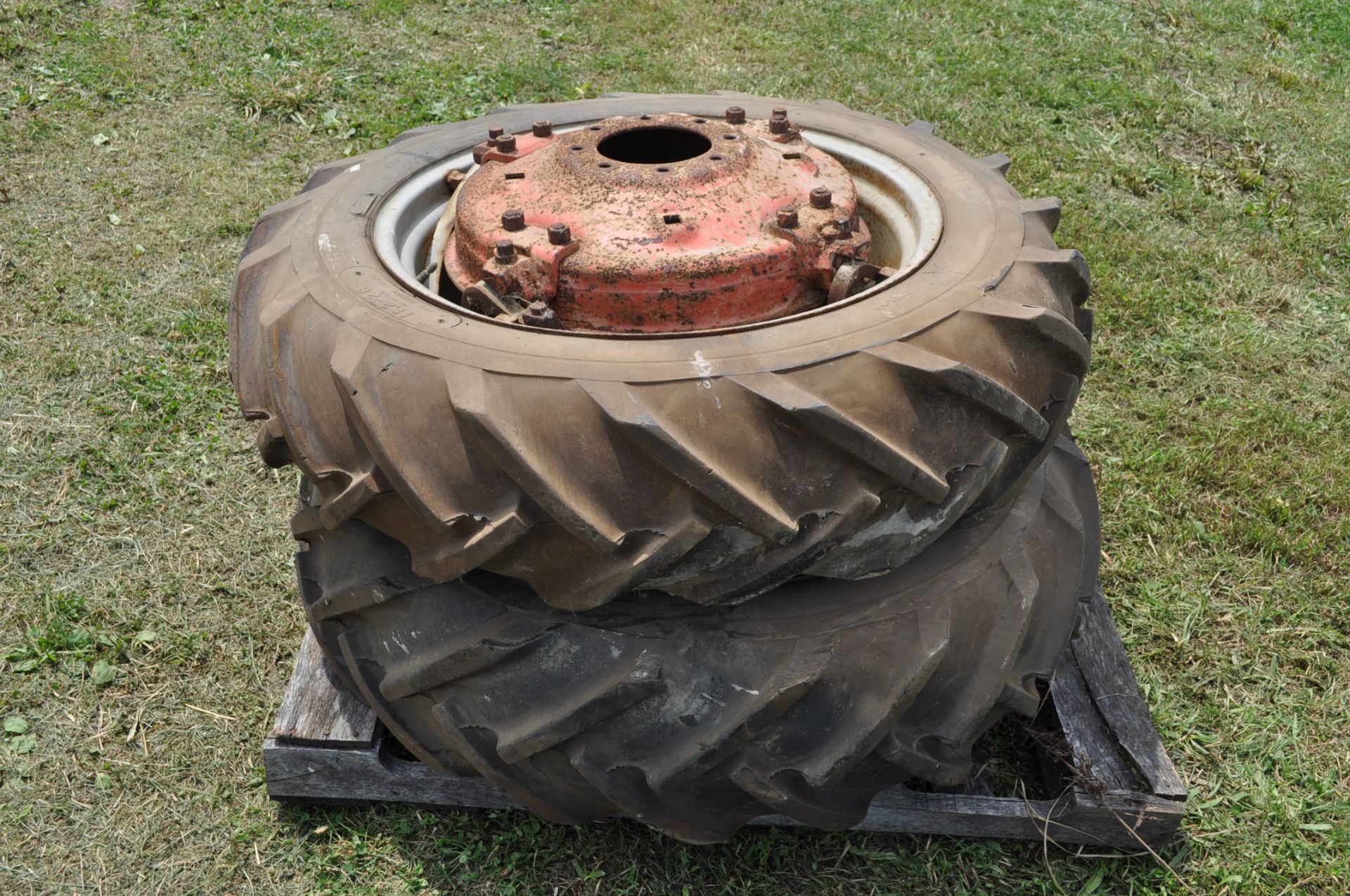 (2) 11.2-28 tractor tires and rims, power adjust, 8 bolt centers, Walters Farm Bob & Linda