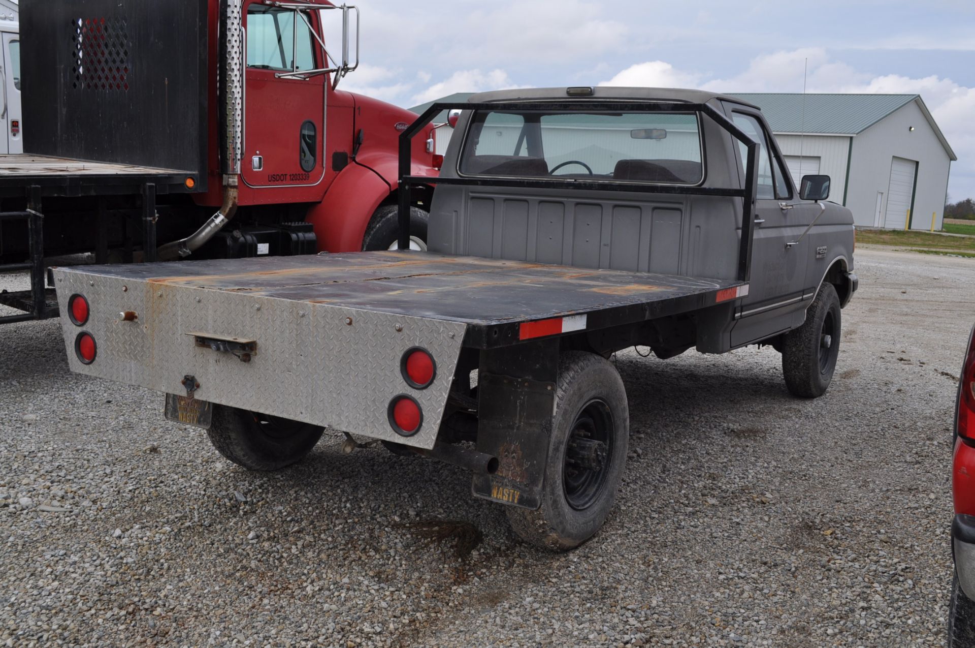 1988 Ford F-250, 4x4, V-8 gas, auto, reg cab, flatbed, shows 44,935 miles, VIN 1FTHF26H7JNA61411 - Image 4 of 11