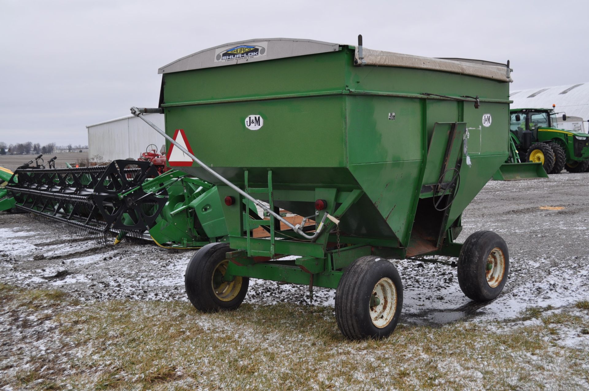 J&M 250 bu gravity bed wagon on running gear, - Image 3 of 4