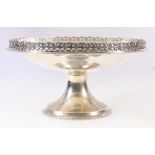 George V silver pedestal bowl with pierced fleur de lys border.