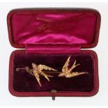 Yellow metal twin swallow bar brooch set with rubies and pearls, possibly 15ct gold, 6.8g, 5.