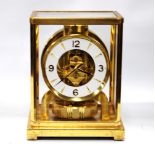 Jaeger le Coultre 'Atmos' mantel timepiece in glazed brass with angled corners, 23cm,