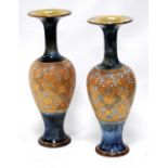 Pair of Royal Doulton vases each with flared rims, blue glaze and floral decoration, stamped 8901,