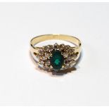 Dress ring with oval synthetic emerald and small diamond brilliants in gold, '14k', size Q.
