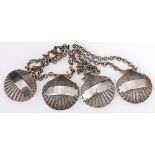 Set of four heavy silver decanter labels of cast scallop form, engraved for Brandy, Port,