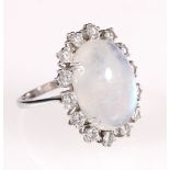 Attractive Labradorite and diamond dress ring with oval cabochon and fourteen brilliants,