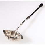 Silver toddy ladle with fluted oval bowl, scroll stem and ebony handle by David Hennell, 1750.