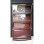 Mahogany Globe-Wernicke bookcase of rectangular form with three glazed and one panelled section,