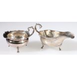 Silver sauce boat with gadrooned border, 1967, and a cream jug of compressed shape by Harry Atkin,