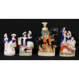 Staffordshire horse and rider figure group and three other figures of couples.