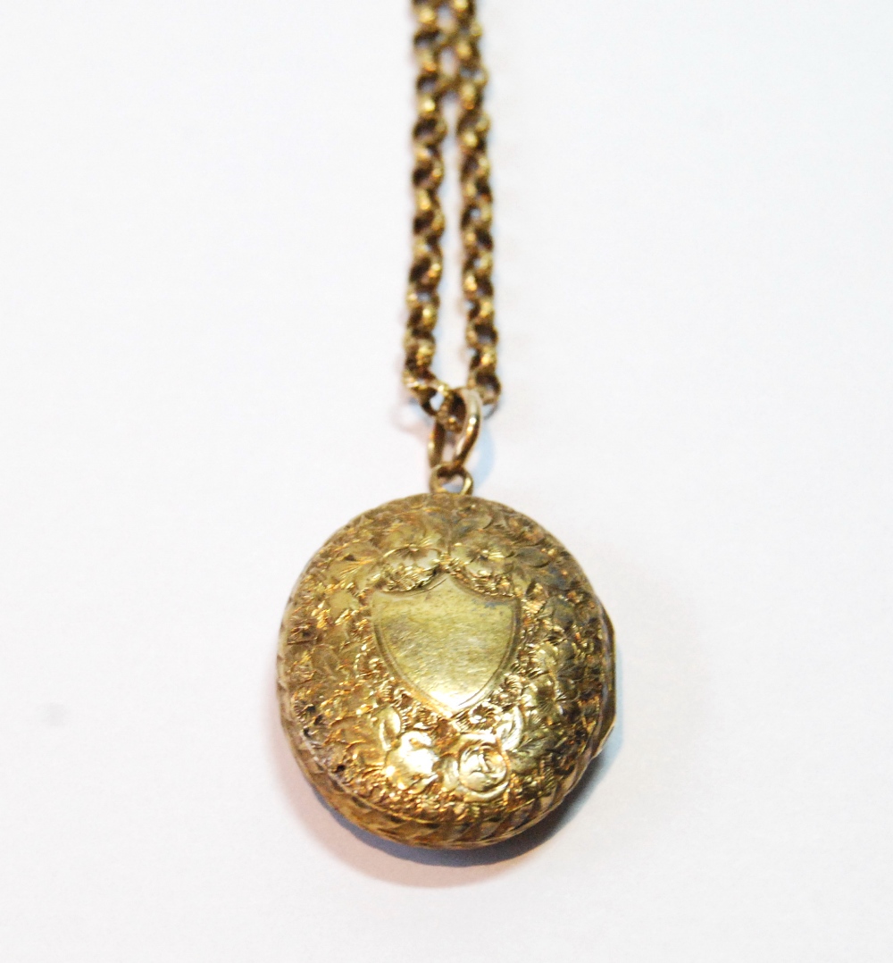 Victorian engraved gold oval locket, 22mm, with necklet, probably 15ct, 10g.