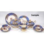 19th century porcelain tea set with polychrome floral sprays and mauve and gilt scroll borders.