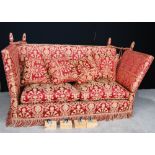 Knoll sofa upholstered in red and gold, with loose feather cushions, 190cm wide and 120cm high.