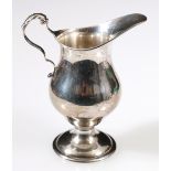 Silver cream jug of plain bellied shape, Birmingham 1963.