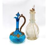 Bohemian blue glass claret jug and stopper with lion mask decoration,