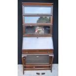 Oak Globe-Wernicke bureau bookcase with three glazed sections over fall flap enclosing a fitted