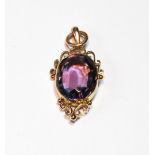 Gold pendant with oval amethyst in rose gold, '9c'.