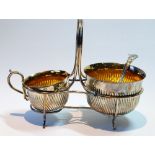 Silver sugar and cream, part fluted with sifter and wire frame, by Hamilton & Inches,