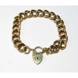 9ct gold curb bracelet with padlock snap, 20g.