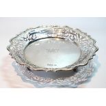 Silver circular fruit dish with pierced border on scroll feet by Goldsmiths & Silversmiths Co, 1911,