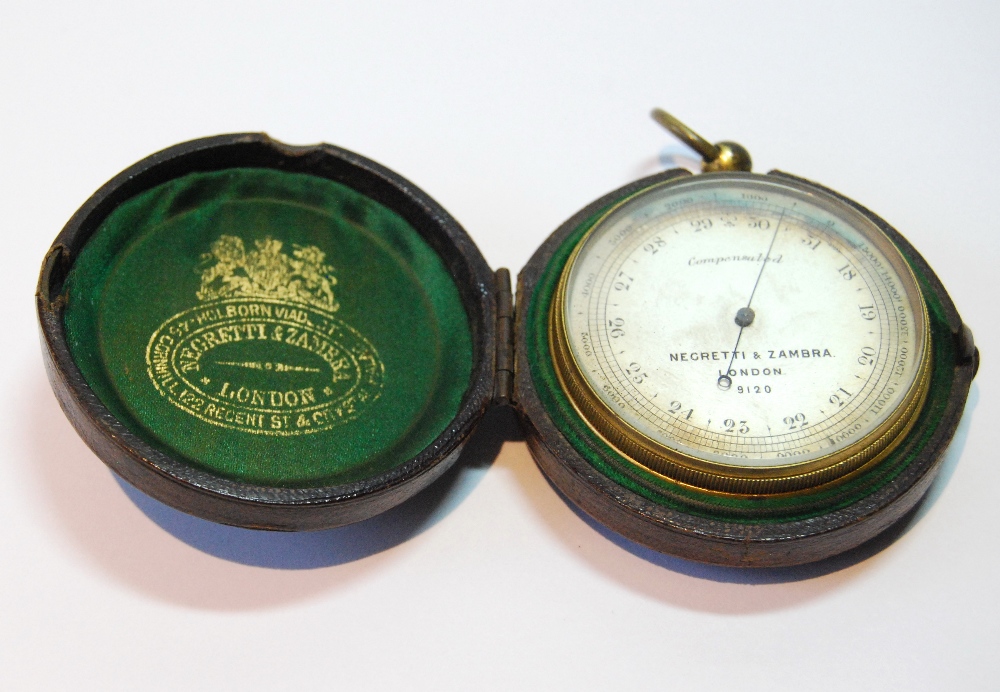 Pocket aneroid altimeter by Negretti & Zambra, no. 9120, gilt brass, in original carrying case.