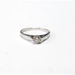 Diamond solitaire ring with brilliant, approximately .33ct, in 18ct white gold.