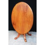 Victorian oval mahogany looe table raised on column supports and carved cabriole legs,