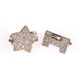 Two white gold clips with pave mixed-cut diamonds, '14k', 5g.