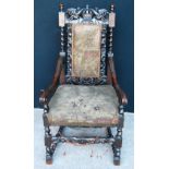 Victorian open armchair with elaborate carved back with crown, acanthus carved down-swept arms,