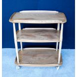 Ercol Golden Dawn beech and elm three-tier trolley, 72cm wide and 77cm high.